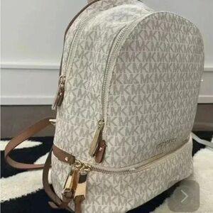 Michael Kors Cream Monogram Backpack with Gold Accents